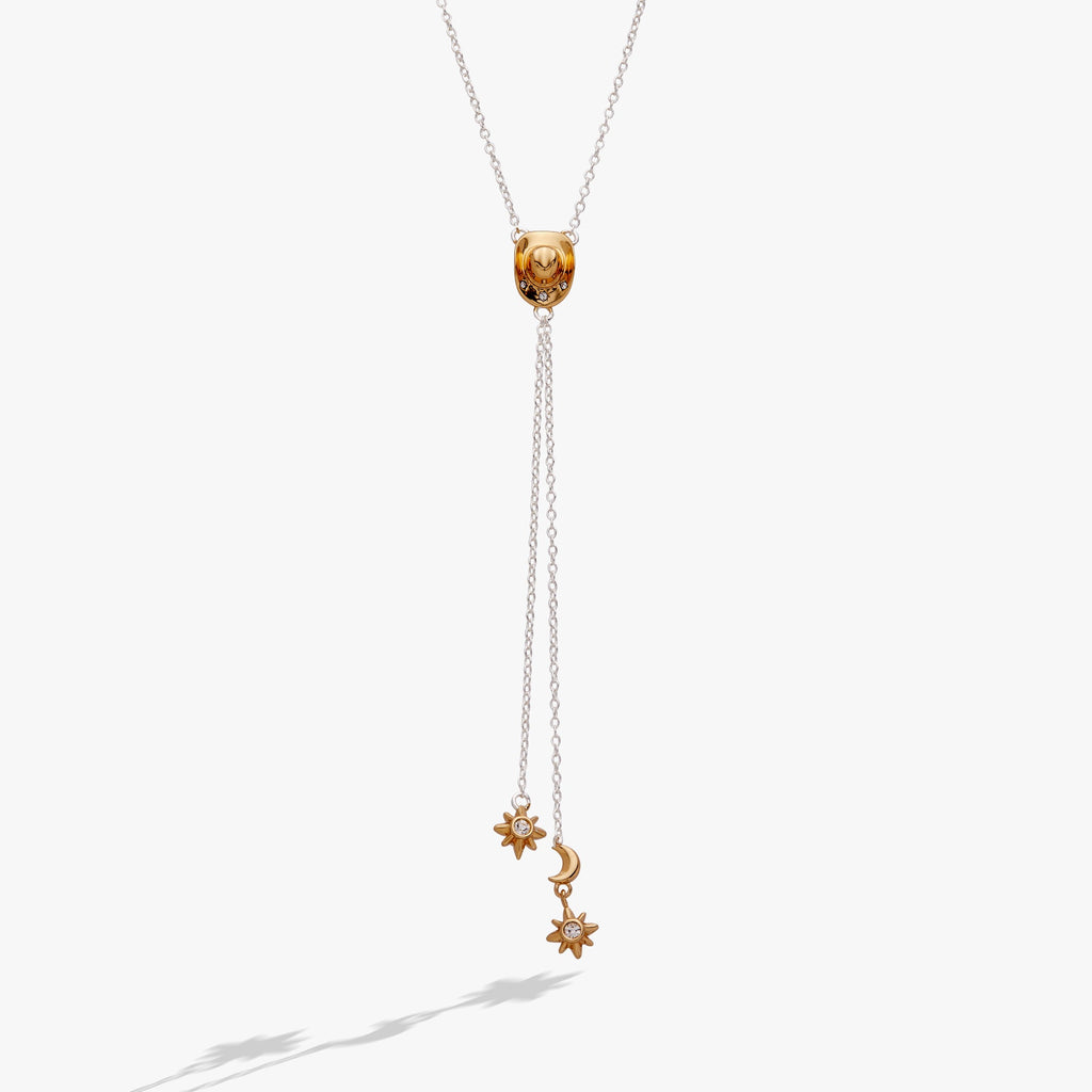 Cosmic Cowgirl Y Necklace with gold and silver charms, stars, moons, and crystals on a cable chain