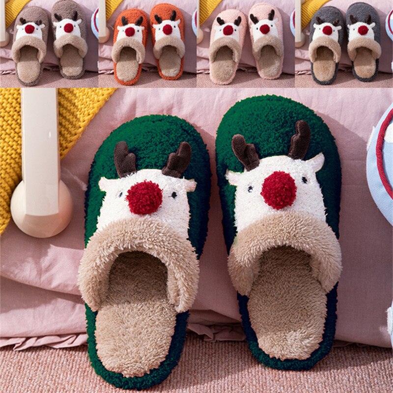 Close up of cute Christmas deer design plush indoor slippers with memory foam and non-slip sole