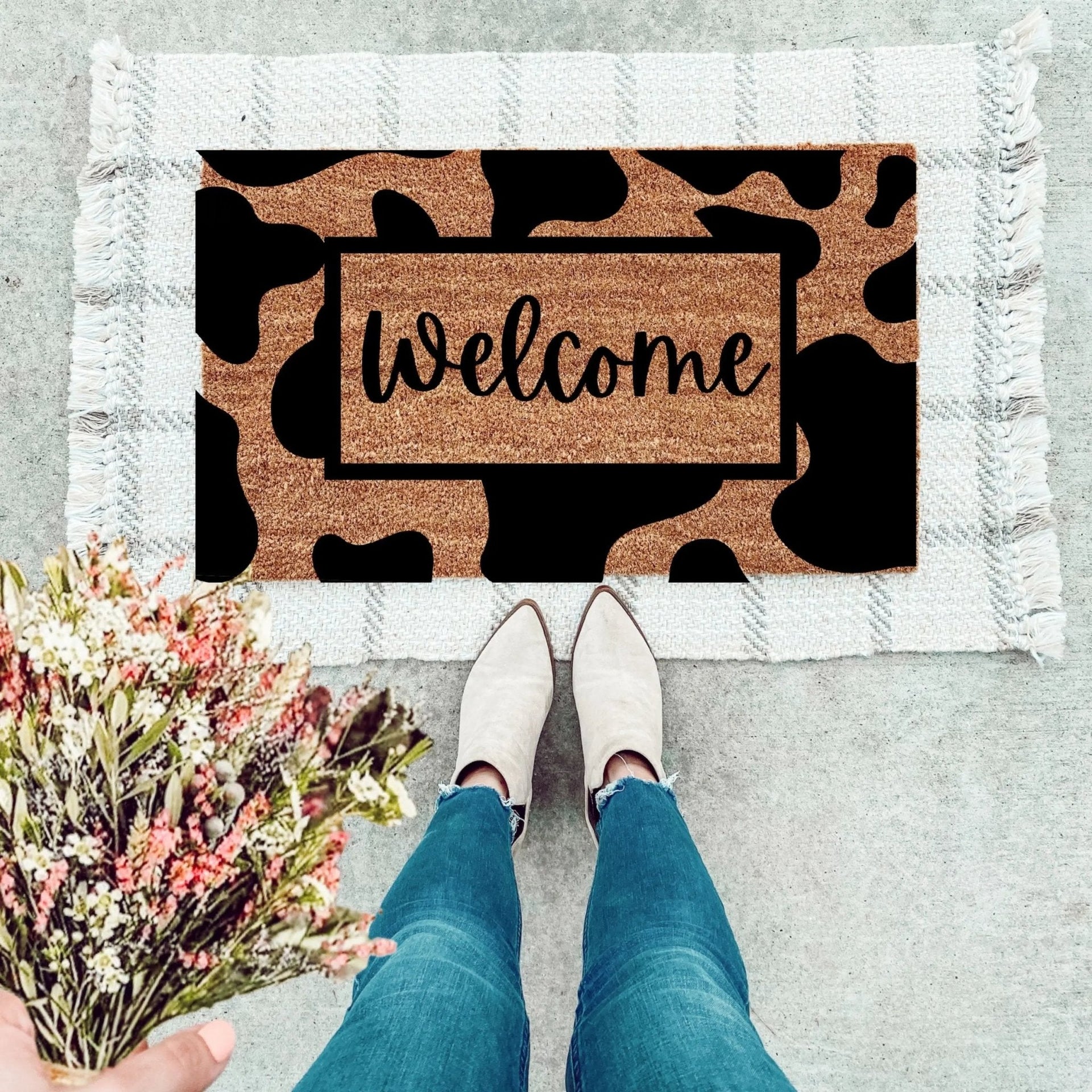 Rustic cow print welcome doormat for front porch entryway