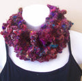 Handmade buttoned silk cowl crochet project featuring premium handspun recycled yarn.