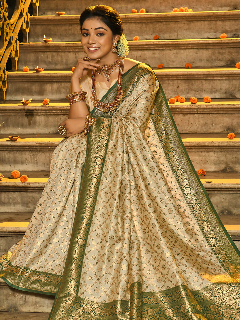Rajvastra Dark Green Banarasi silk saree with luxurious sheen