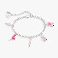 Tickle Me Pink charm bracelet featuring enamel flamingo, ballet slippers, ice cream, pencil, and tulip charms on a chain.