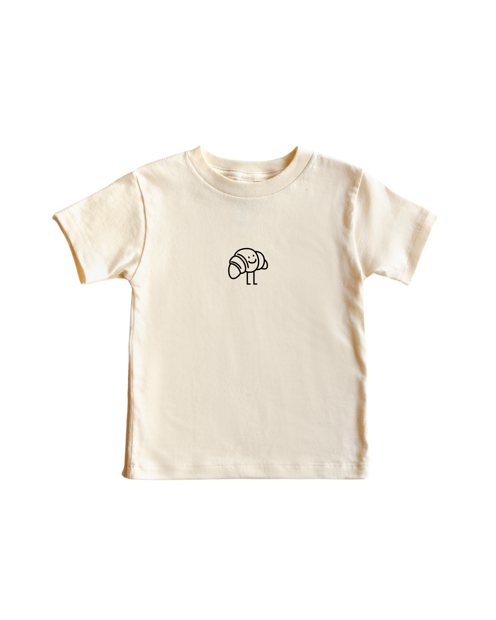 Minimalist cotton t-shirt featuring a small croissant icon, available in cream and pink.