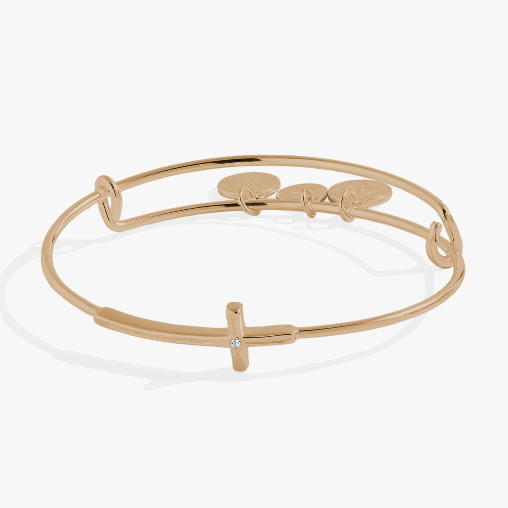 Minimalist bangle bracelet featuring a crystal-embellished cross design.