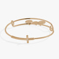Minimalist bangle bracelet featuring a crystal-embellished cross design.