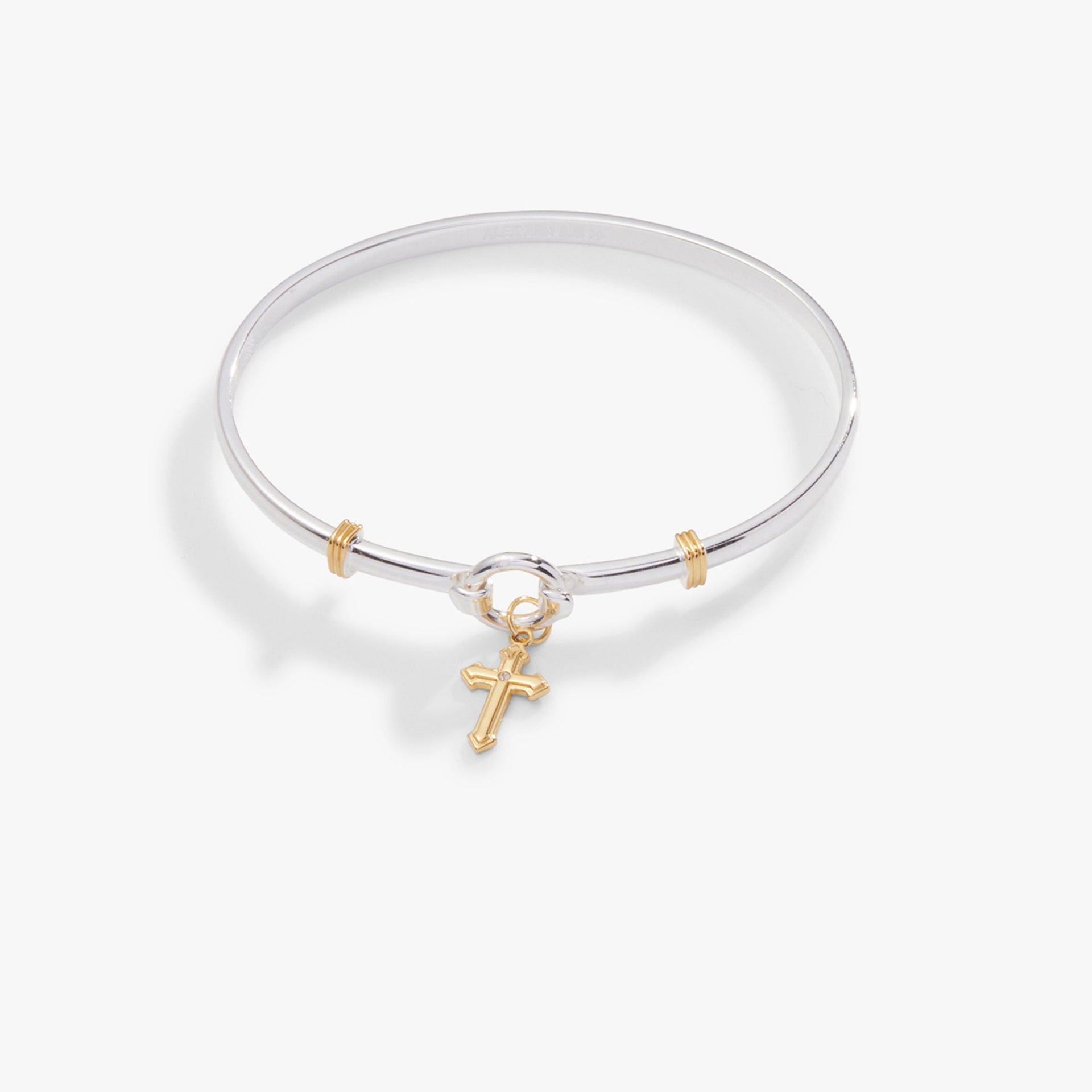 Two-tone silver and gold cross clip bangle featuring a minimalist charm and tension-clip design.