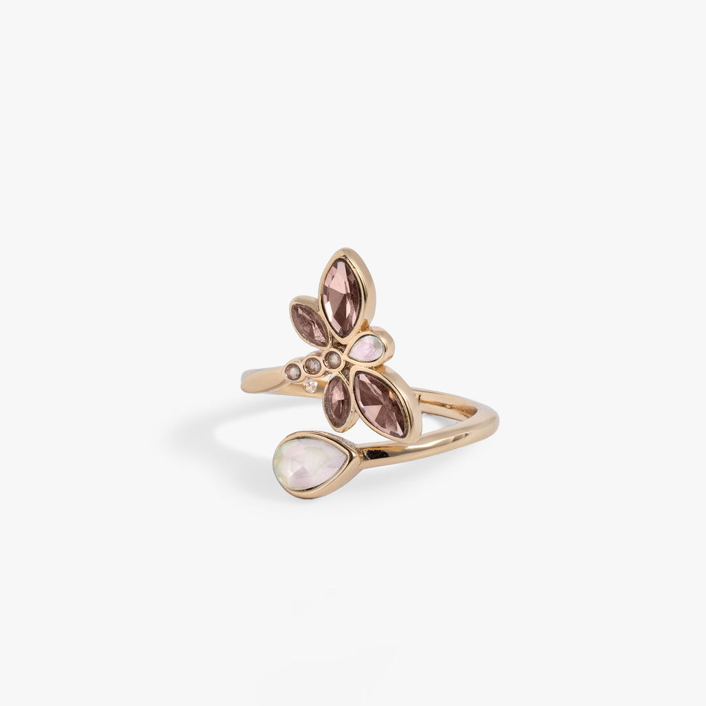 Crystal Dragonfly Wrap Ring with white opal and light rose crystals on a clean background