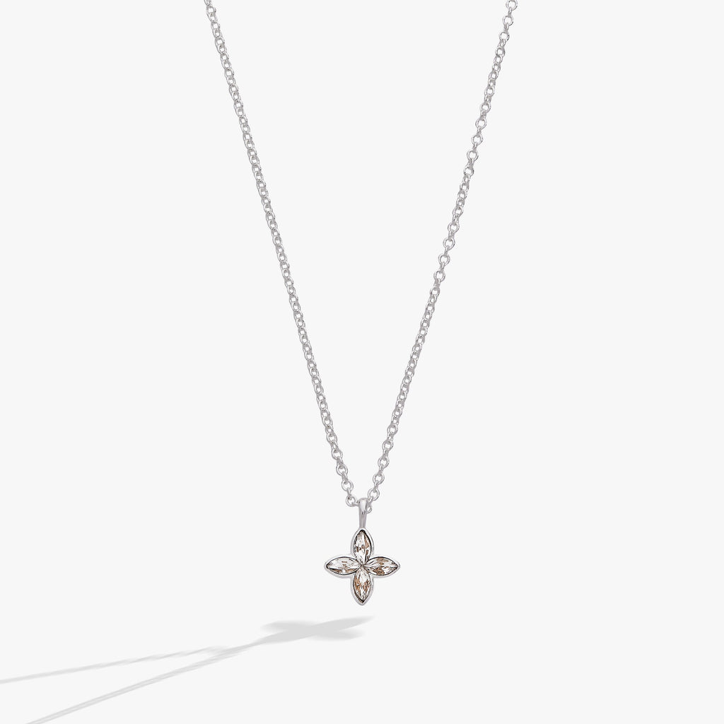 Minimalist silver necklace featuring a marquise-cut clear crystal star pendant on a delicate cable chain