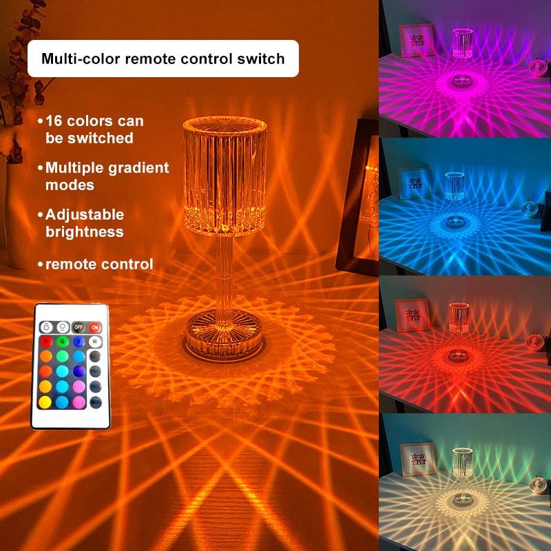 Multicolor diamond-shaped crystal LED table lamp on a modern bedside table