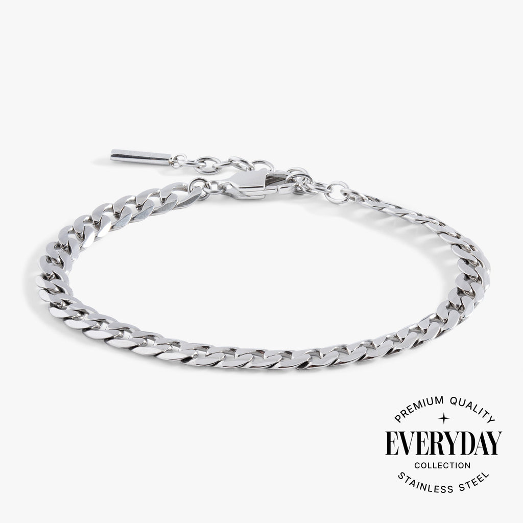 Modern silver flat curb chain bracelet made of durable stainless steel for everyday wear.