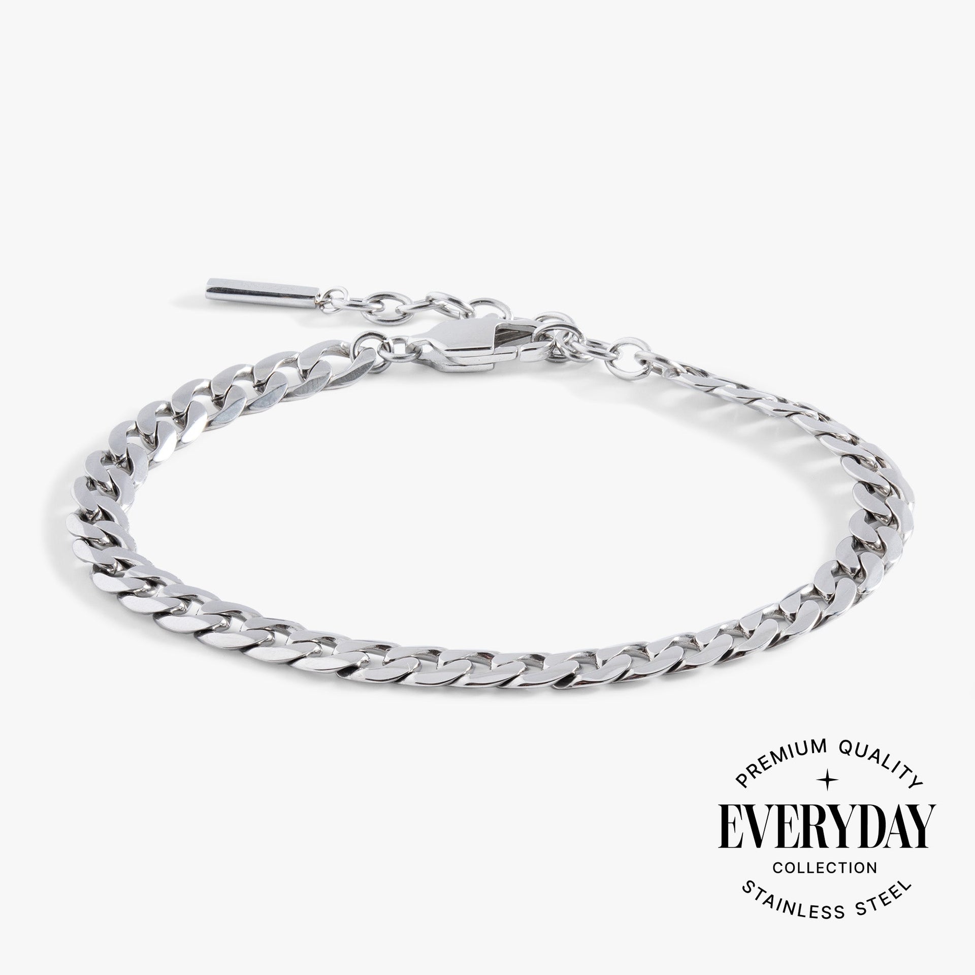 Modern silver flat curb chain bracelet made of durable stainless steel for everyday wear.