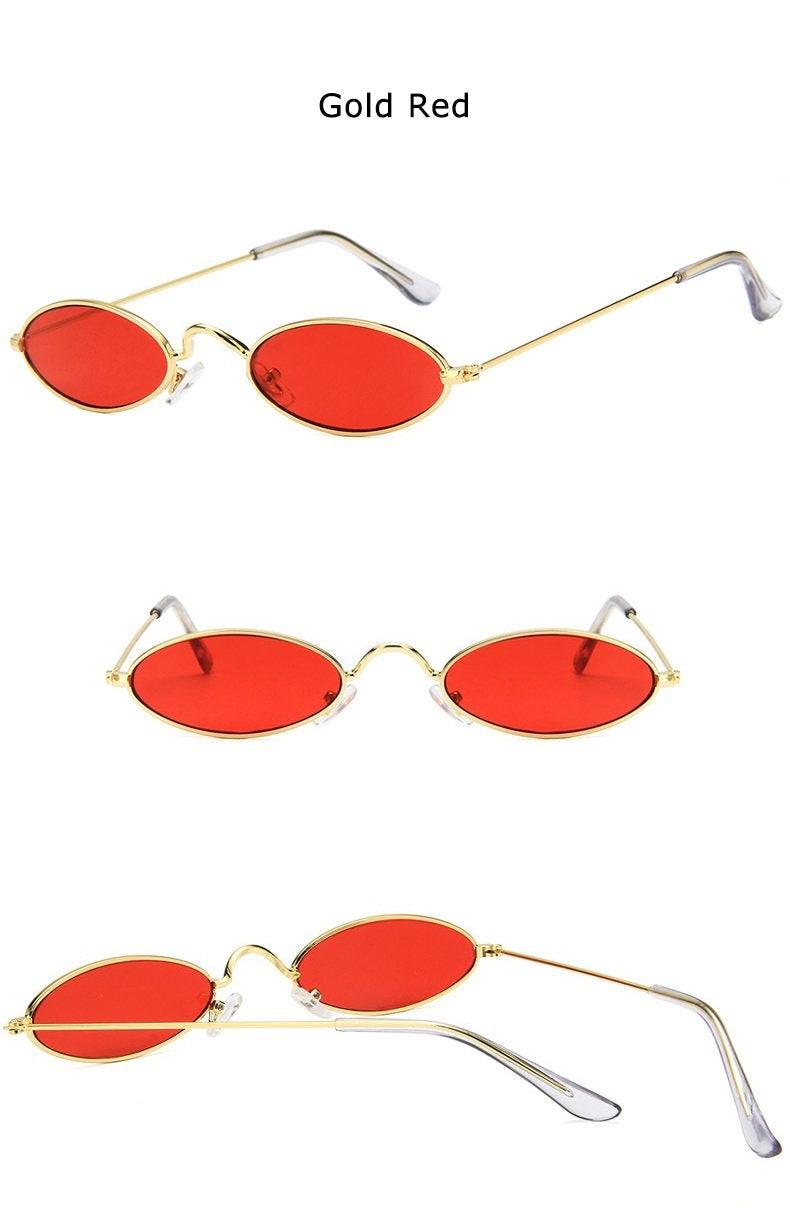 Retro Black Oval Sunglasses with Metal Frame and Nose Pads