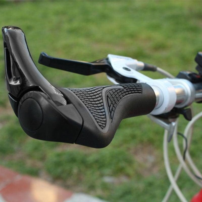 Ergonomic mountain bike grips with black aluminum alloy bar ends mounted on handlebars