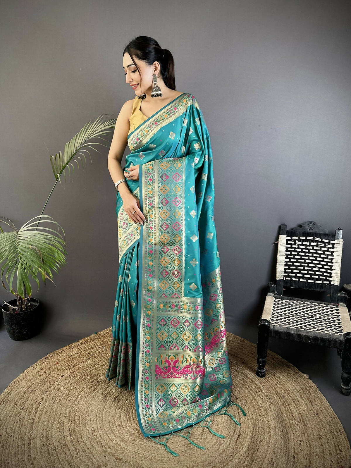 Turquoise Blue soft silk Patola saree with geometric patterns and matching blouse