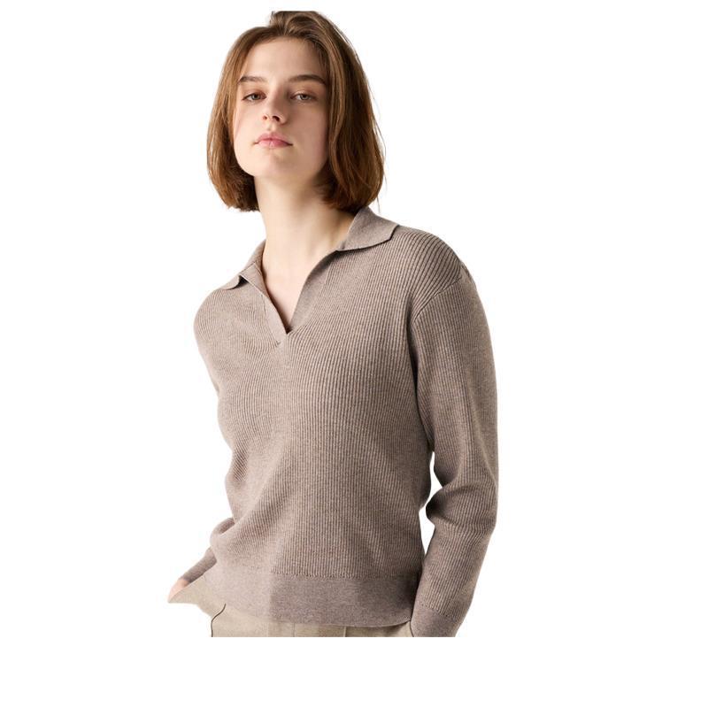 Model wearing a taupe ribbed half-open collar sweater with matching lounge pants