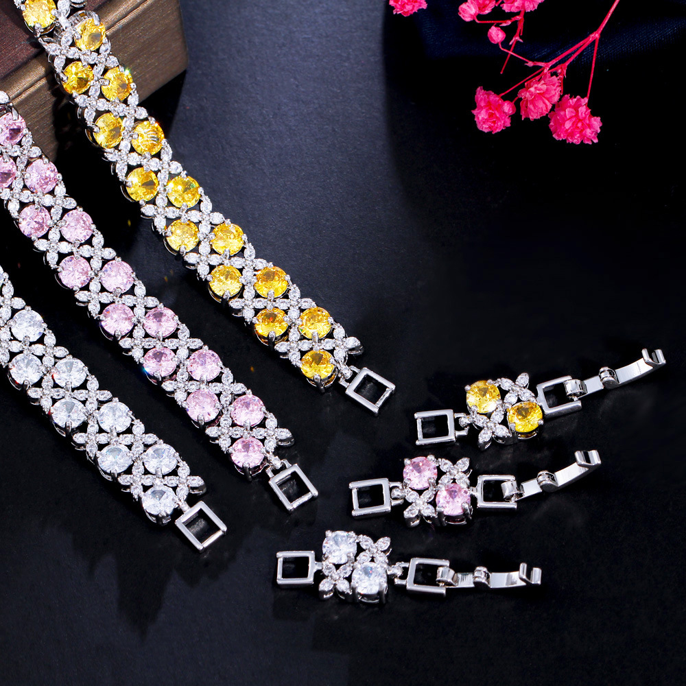 Close up of a Vera Lux S925 silver bracelet featuring micro-inlaid sparkling cubic zirconia gemstones.