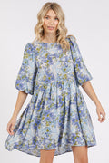 Floral print linen blend babydoll mini dress in a feminine and flowy silhouette
