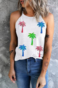 Woman wearing a white tank top with colorful sequin palm tree graphics