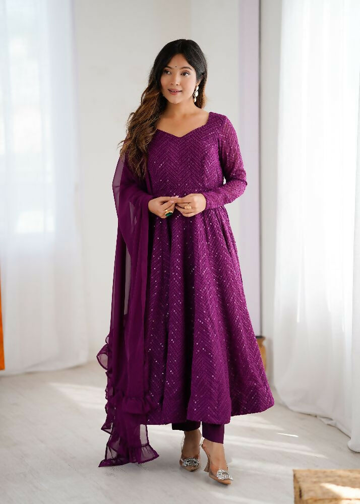 A 3-piece wine georgette kurta set with detailed sequence embroidery and matching dupatta.