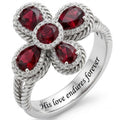 Minimalist 925 sterling silver ring featuring a floral cluster of red pear and oval gemstones with crystal pave accents.