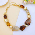 Irregular Acrylic Statement Necklace with Gold Metallic Beads