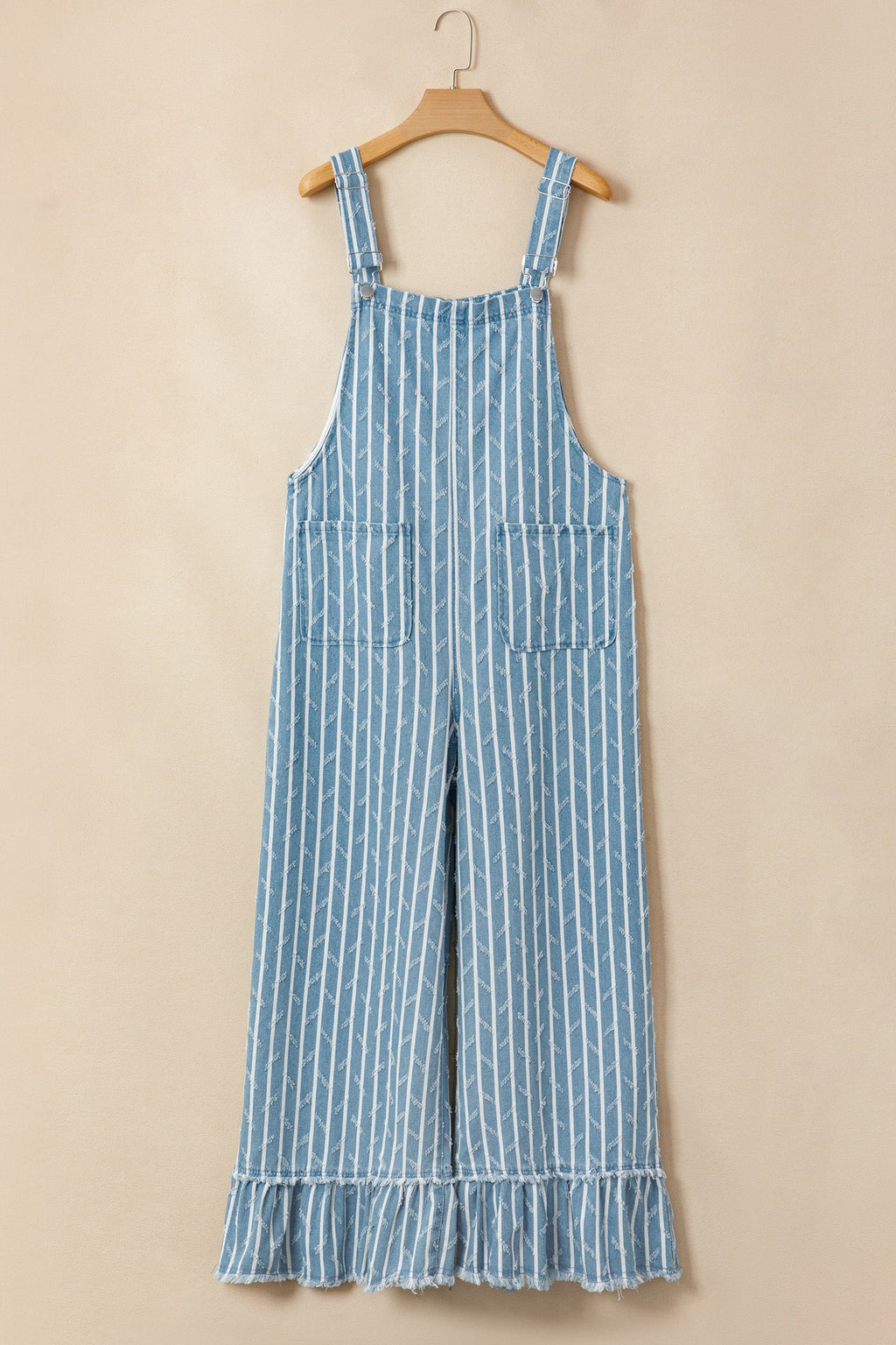 Blue and white striped denim overalls with a wide-leg fit and ruffled hem details.