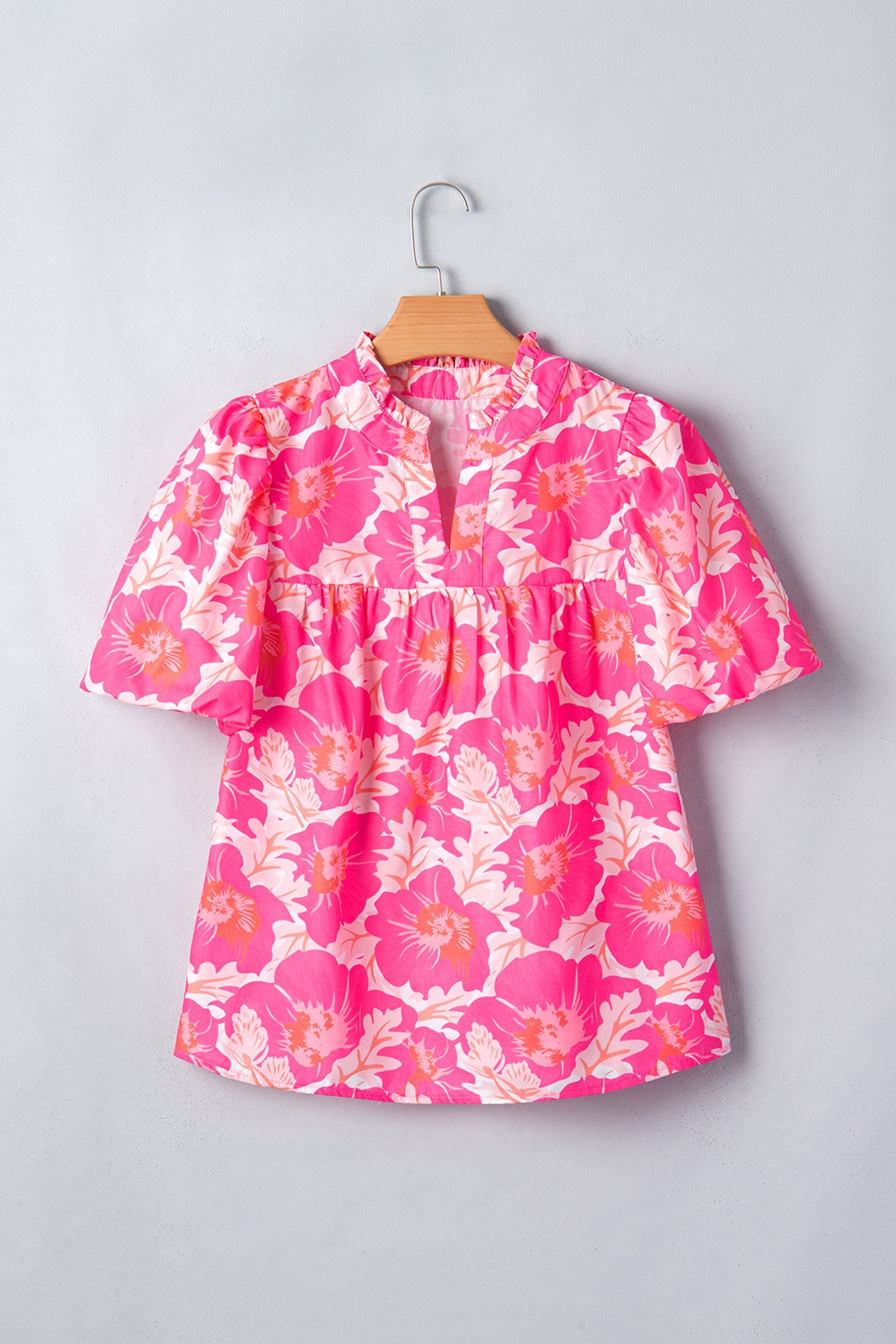 Yellow floral blouse featuring short bubble sleeves and a lightweight summer fit