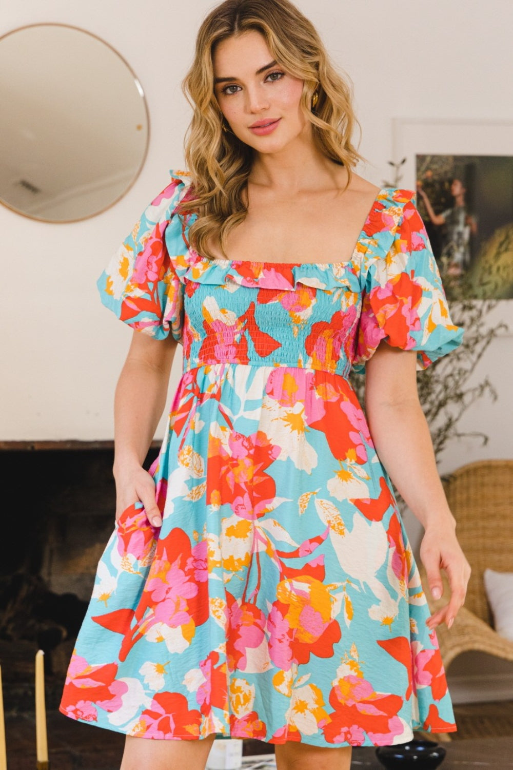 Women's floral print cotton mini dress with smocked bodice and puff sleeves
