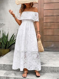A white floral off-shoulder maxi dress with a flowy silhouette perfect for summer resort wear