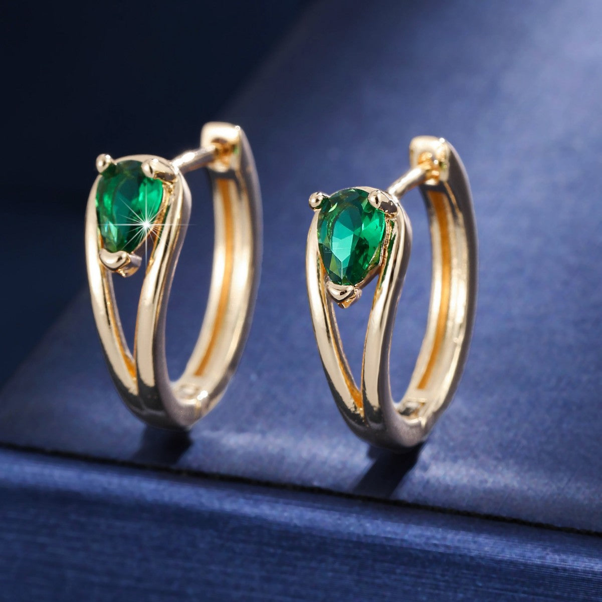 Minimalist water-drop double-twist zircon ear clips in gold finish for women