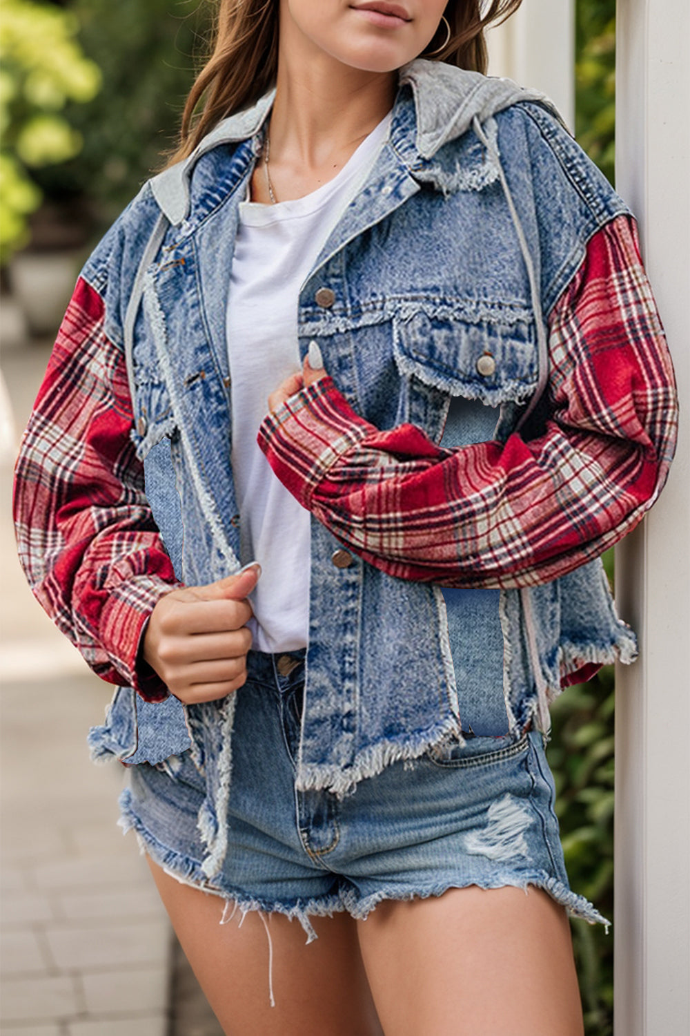 Lady Ros women's denim jacket with red plaid sleeves, grey hood, and raw hem detail