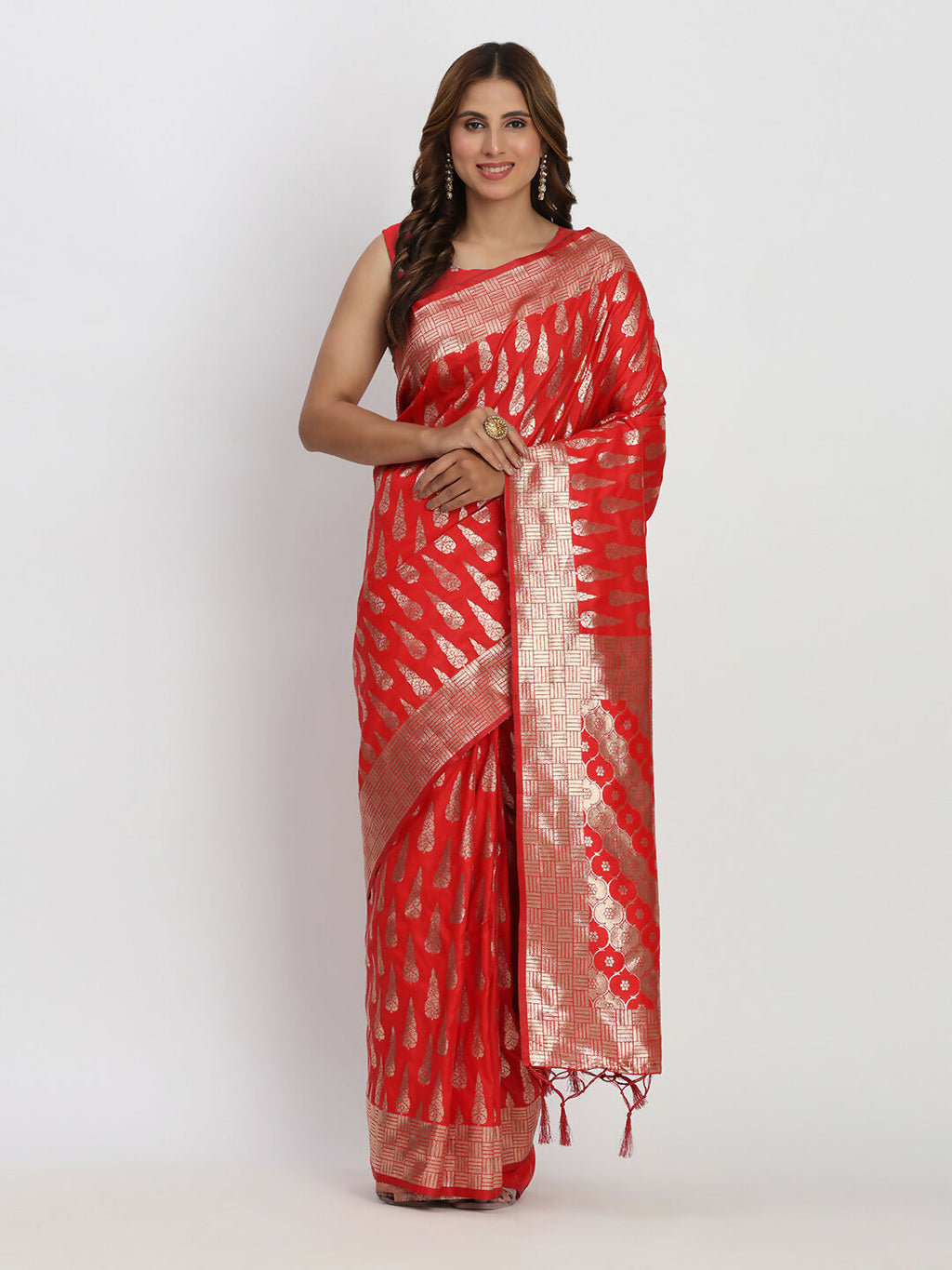 Beautiful red Banarasi silk saree with a matching blouse, perfect for weddings and cultural festivals.