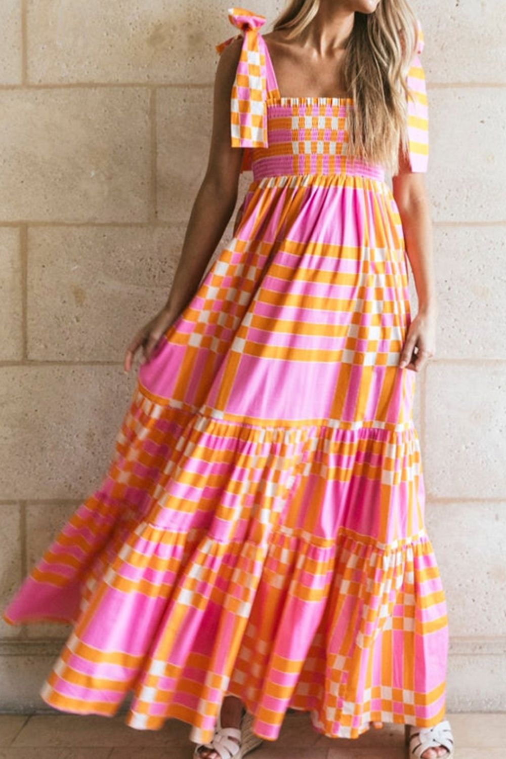 Colorful pink, orange, and white color block summer dress with adjustable tie shoulder straps.