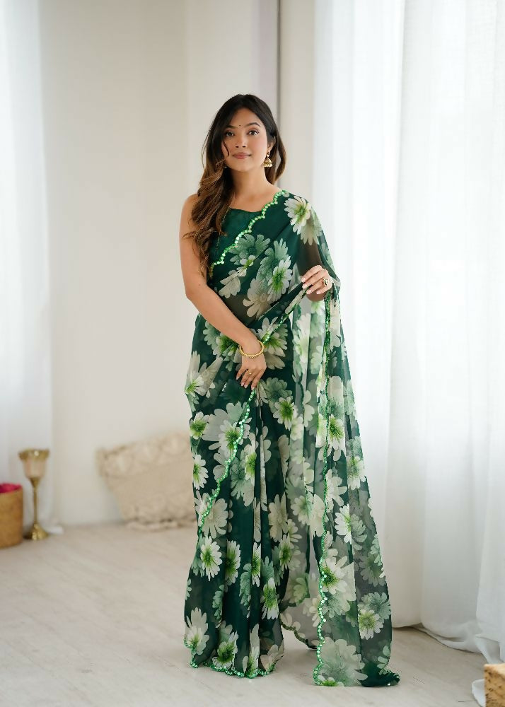 Green georgette saree with printed pattern and detailed mirror work embroidery