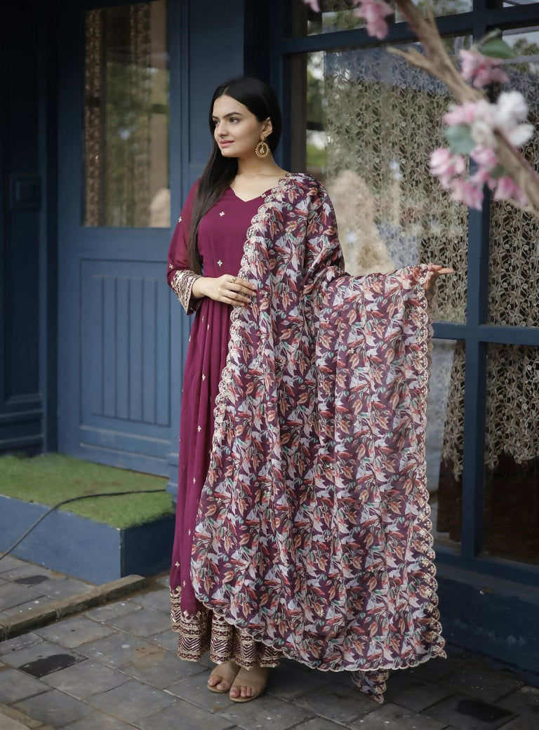 Wine-colored faux blooming Anarkali dress with detailed zari and sequin embroidery