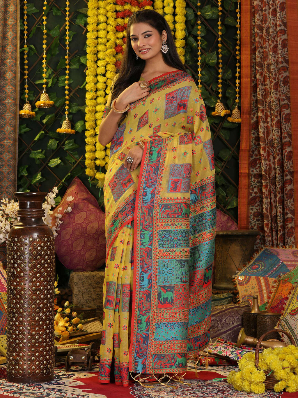 A beautiful yellow linen cotton saree with matching blouse piece draped elegantly.
