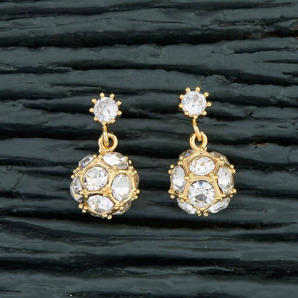 Close up of Golden White AD stone brass earrings for women