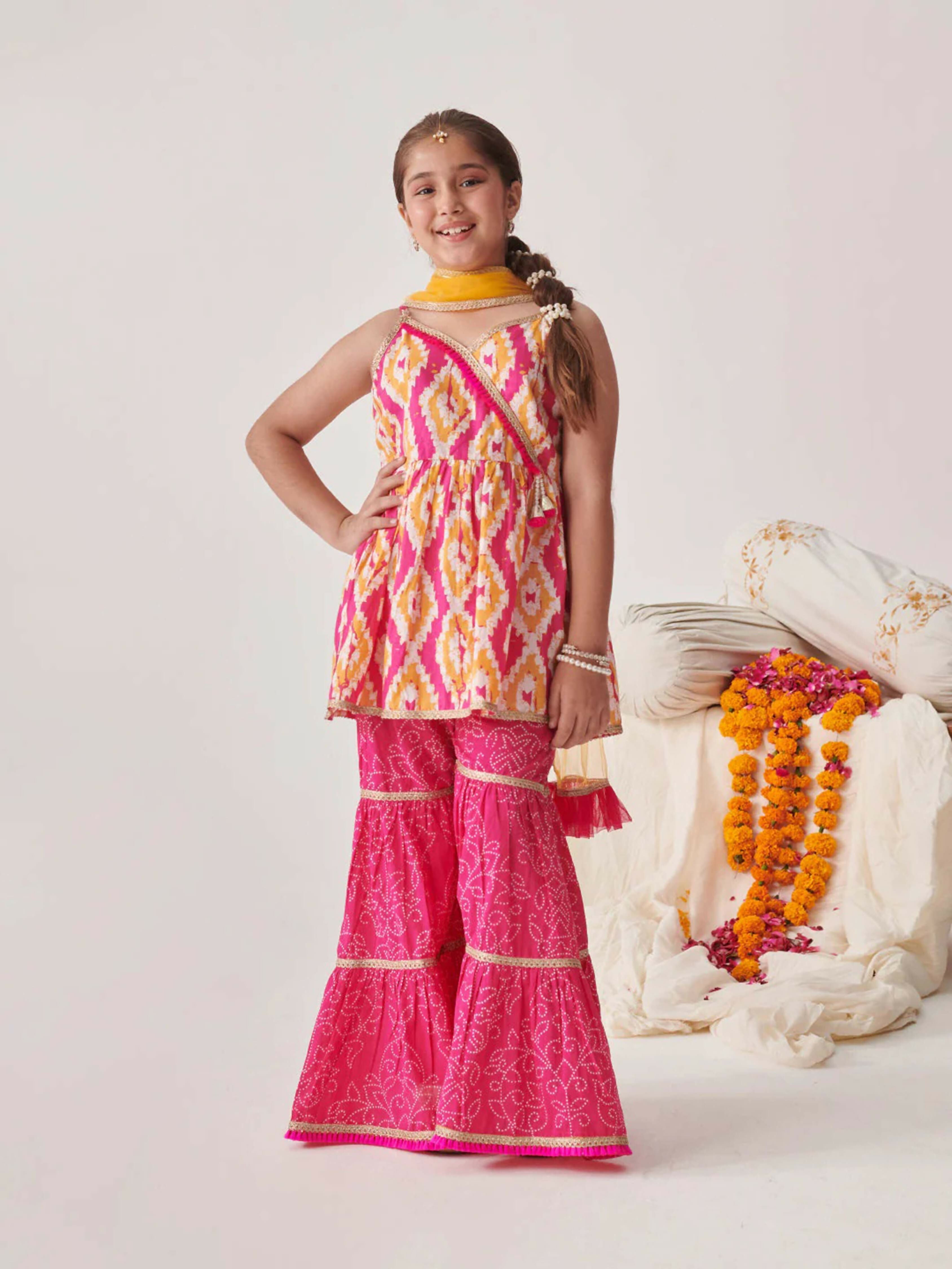 Girl's Pink and Yellow georgette sharara set with a matching net dupatta