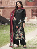 Woman wearing a black velvet straight kurta set with vibrant floral digital print and matching dupatta.