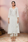 Off white cotton Anarkali suit with detailed golden bead work and matching trousers