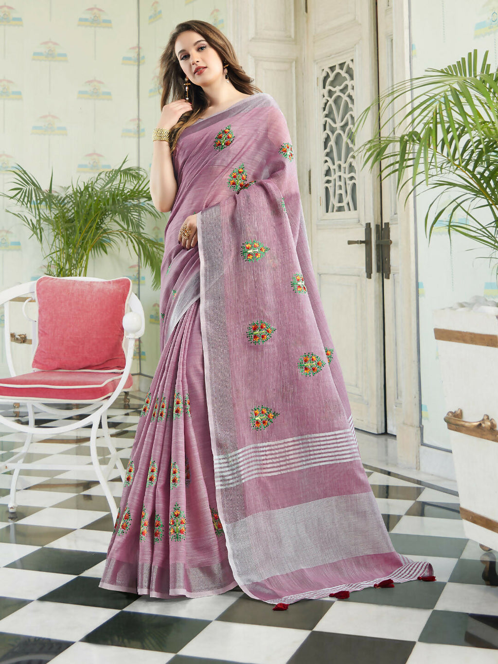 Elegant light purple linen saree with matching blouse piece draped neatly.