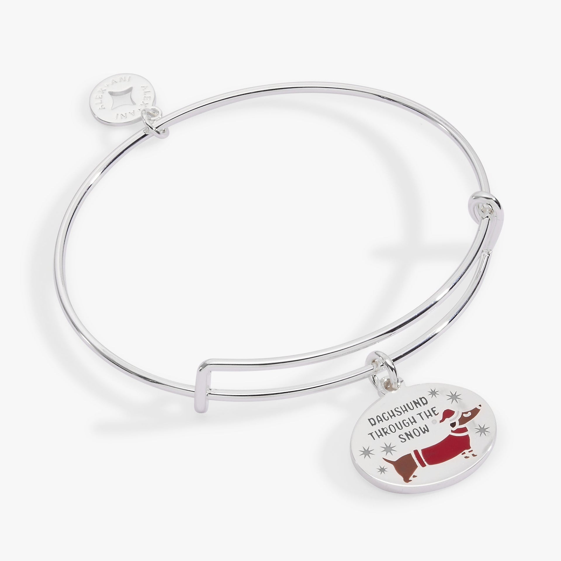 Silver tone charm bangle featuring a Dachshund dog and holiday-themed enamel accents.