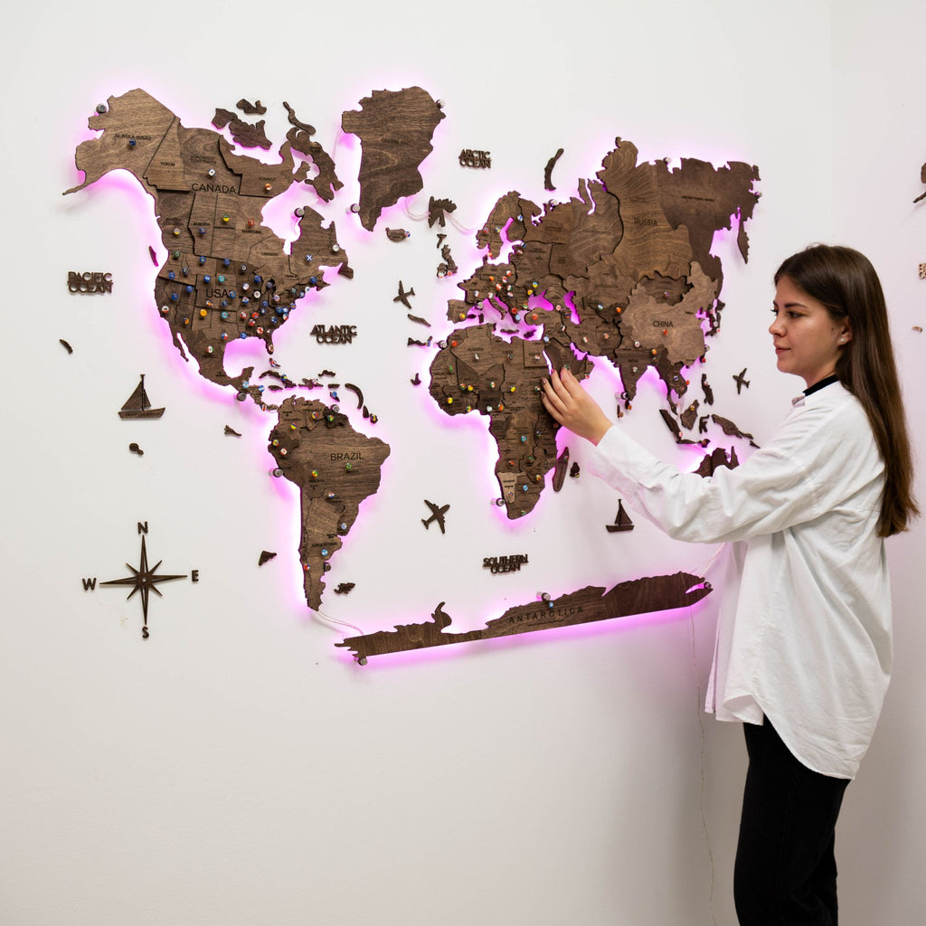 3D wooden world map in dark walnut finish with interactive LED backlight
