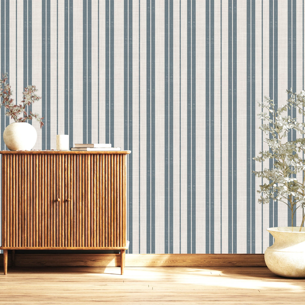 Blue and off-white striped Colbi wallpaper for a classic farmhouse look.