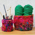 Handmade crochet catchall basket created with Wild Peacock Silk Worsted Weight Yarn