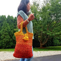 A finished Darn Good Tote Bag made with the easy-to-follow crochet pattern, ideal for groceries or travel.