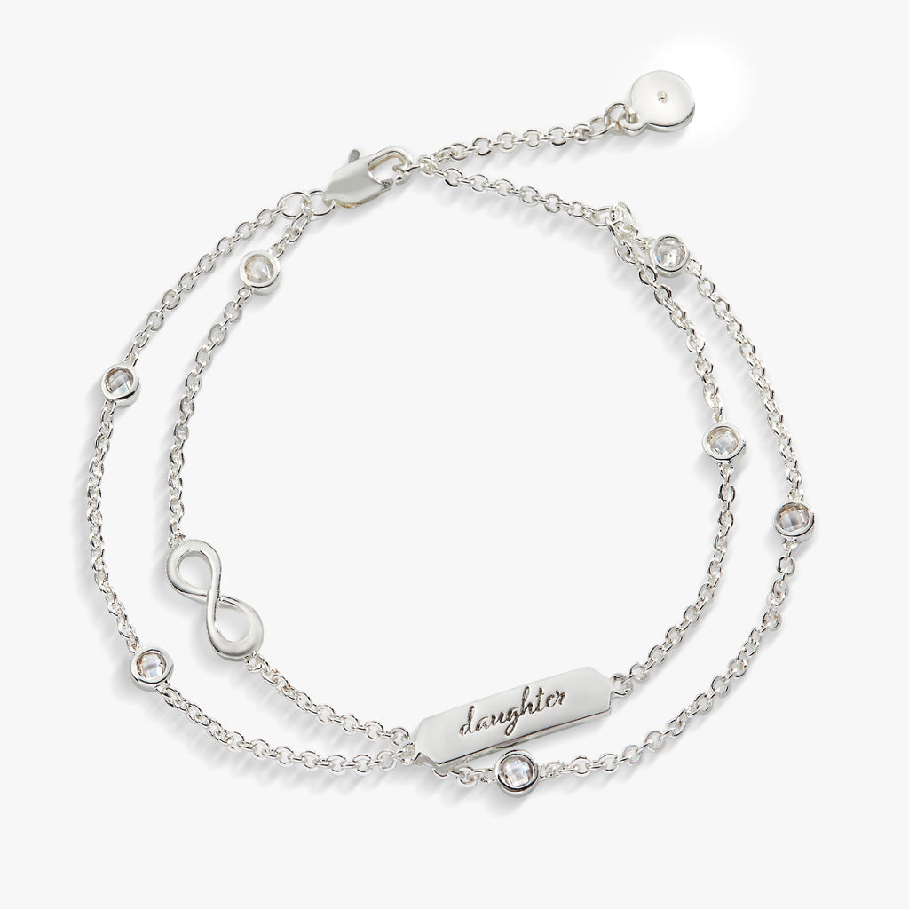Double strand infinity charm bracelet featuring gold and silver tones with clear crystal accents