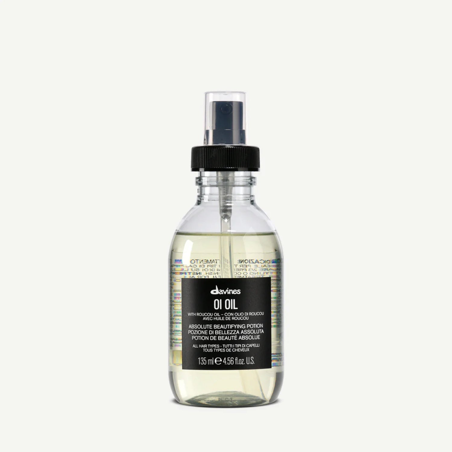 Davines OI Oil bottle in transparent and black minimalist packaging