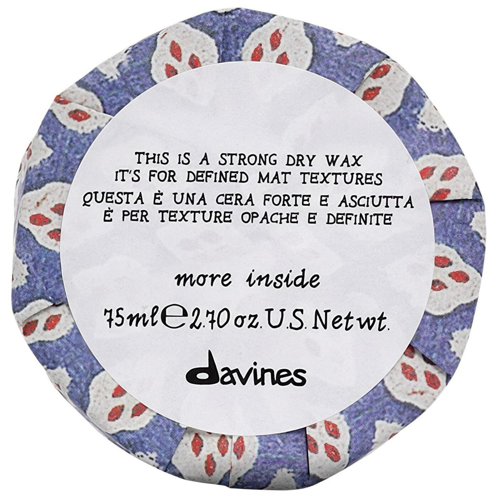 75mL container of Davines This Is a Strong Dry Wax featuring minimalist gold and blue branding.