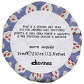 75mL container of Davines This Is a Strong Dry Wax featuring minimalist gold and blue branding.